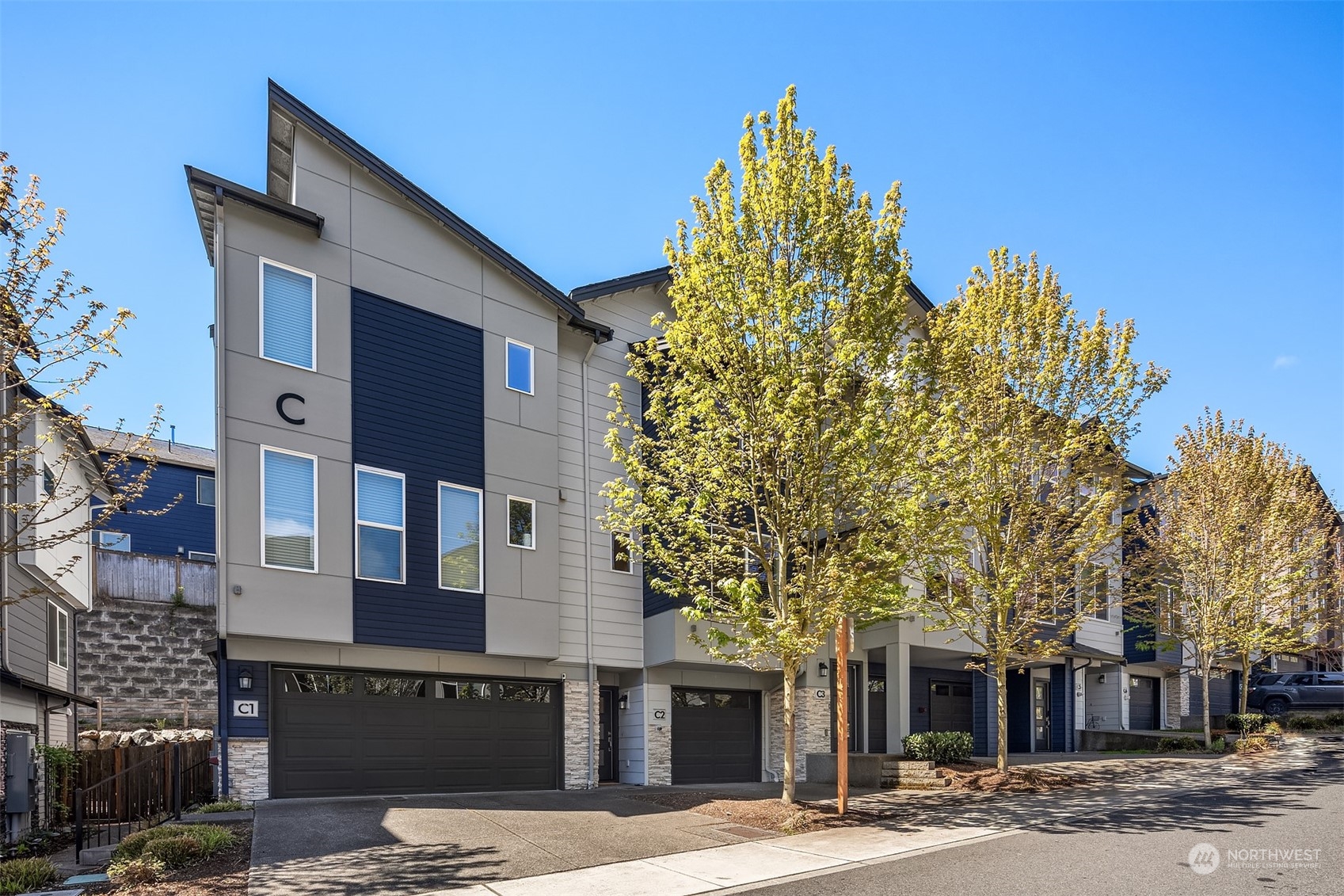 15720 Meadow Road, Unit C2 Lynnwood, WA 98087 - Photo 1 of 23 a front view of a building with street view
