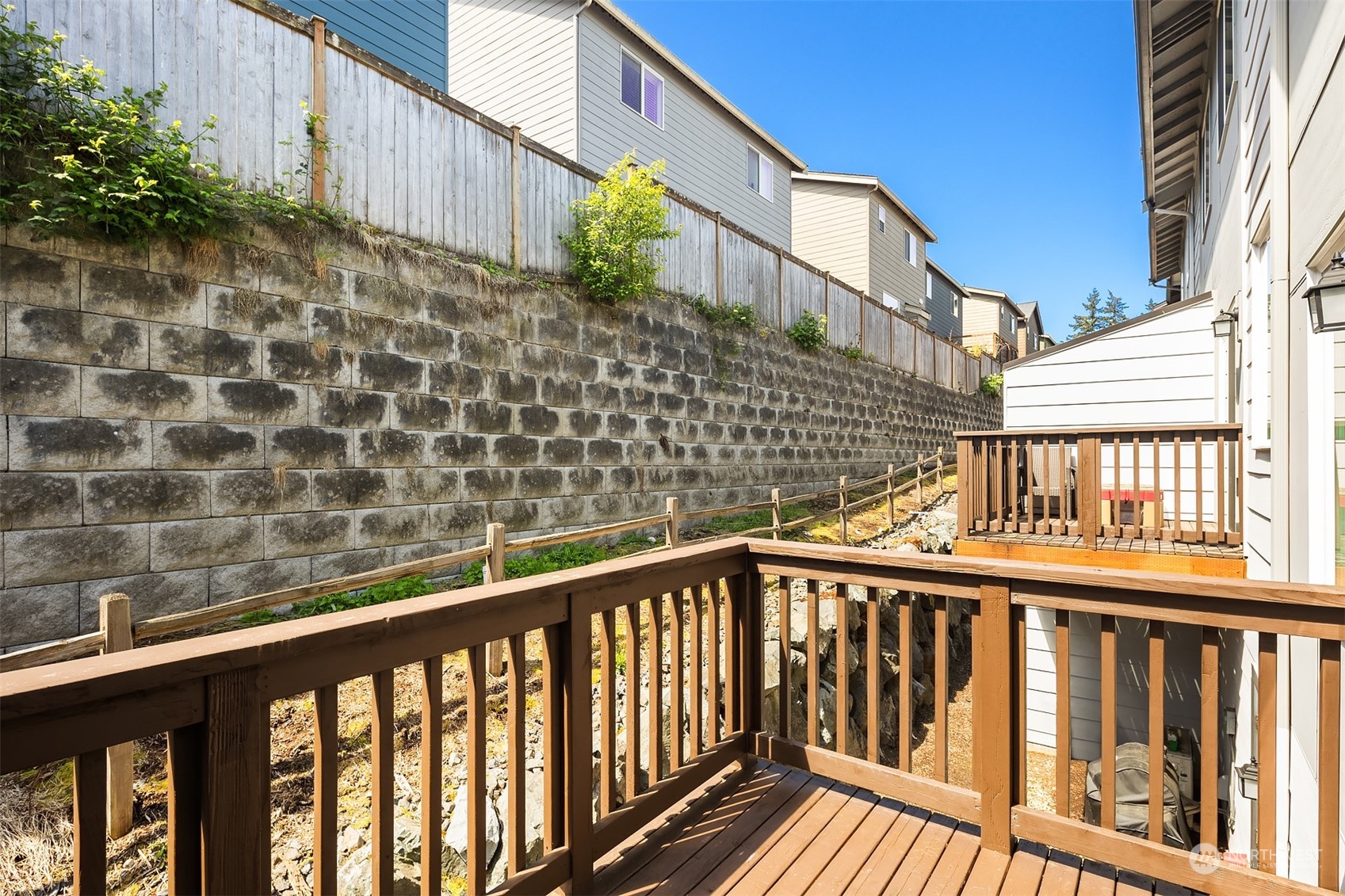 15720 Meadow Road, Unit C2 Lynnwood, WA 98087 - Photo 13 of 23 a view of a brick building from a balcony