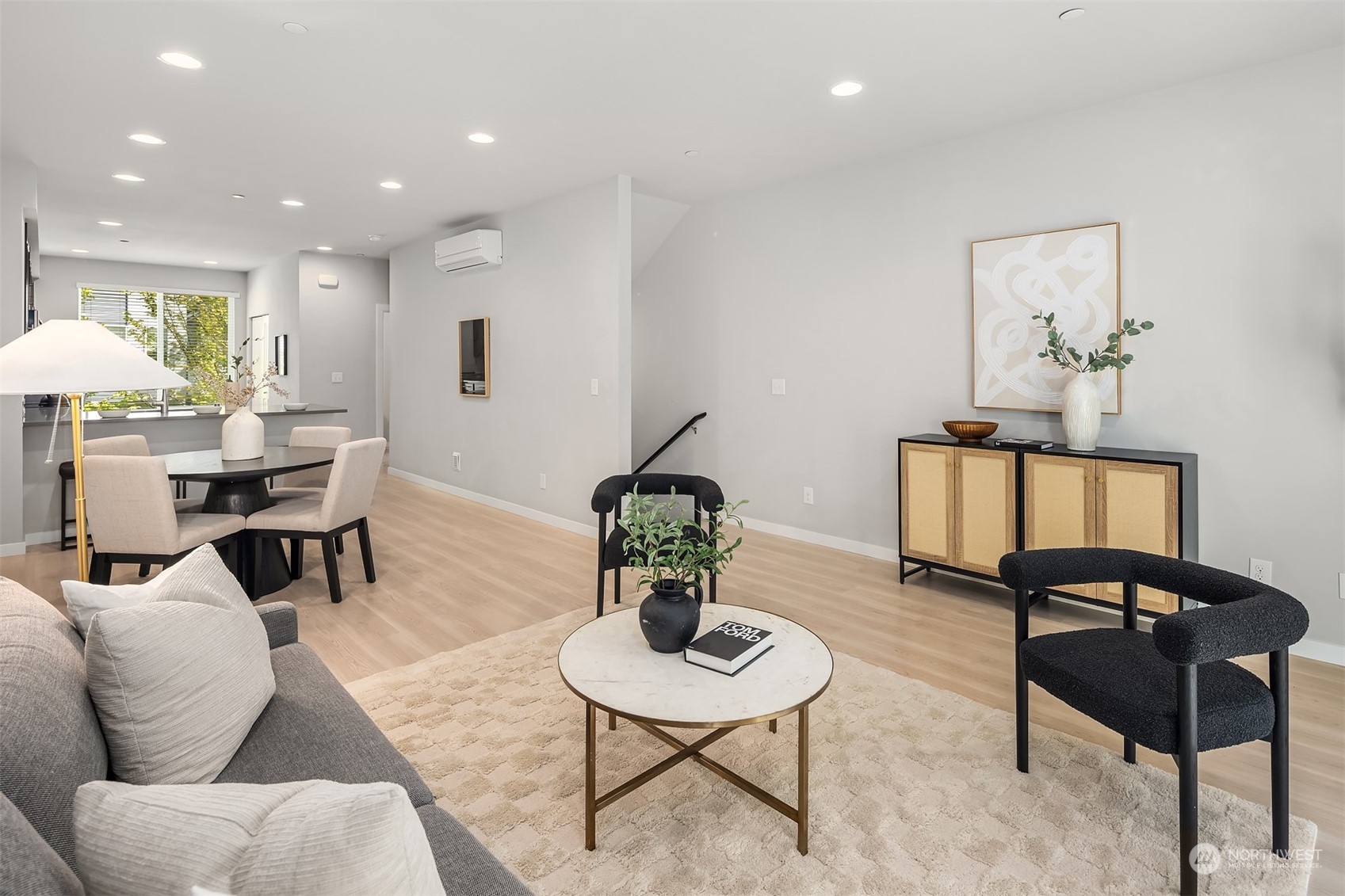15720 Meadow Road, Unit C2 Lynnwood, WA 98087 - Photo 5 of 23 a living room with furniture a rug and a chandelier