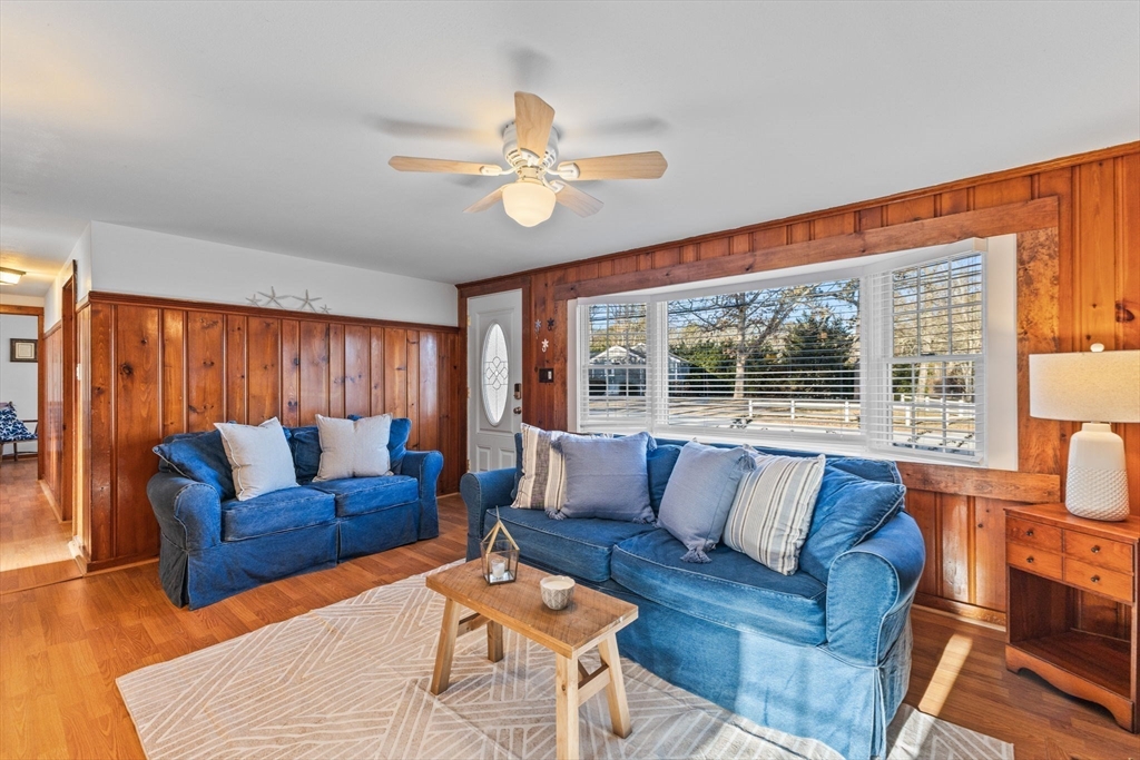 2 Uncle Edwards Road Mashpee, MA 02649 - Photo 11 of 42 a living room with furniture and a large window