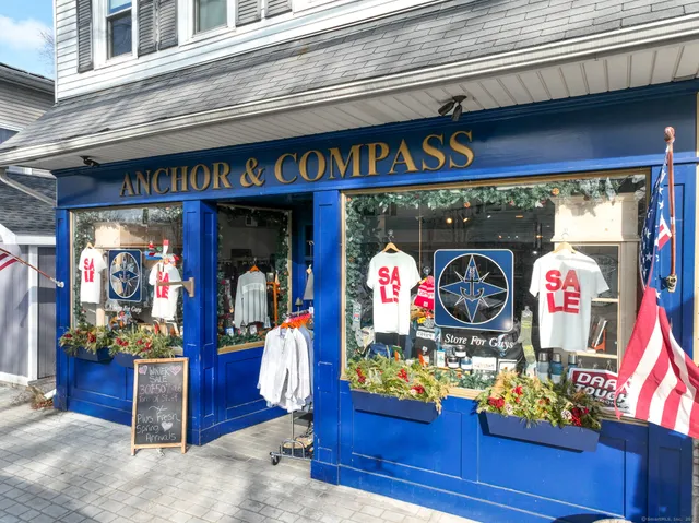 a view of path along with retail shop and buildings