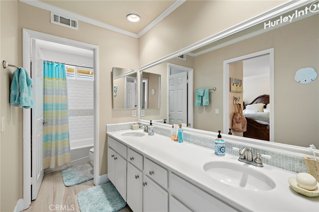 2170 Via Teca San Clemente, CA 92673 - Photo 16 of 20 a bathroom with a double vanity sink mirror and double
