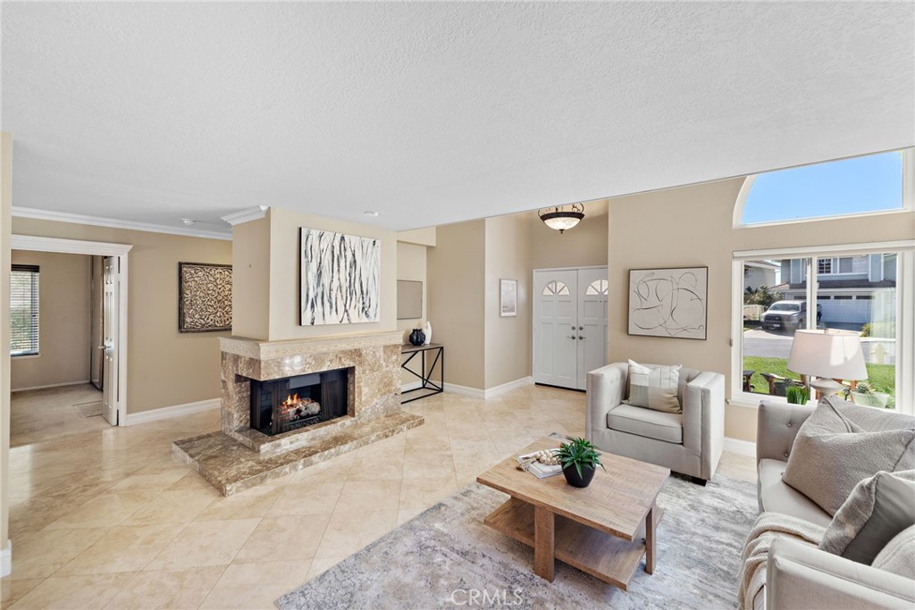 2170 Via Teca San Clemente, CA 92673 - Photo 4 of 20 a living room with furniture and a fireplace