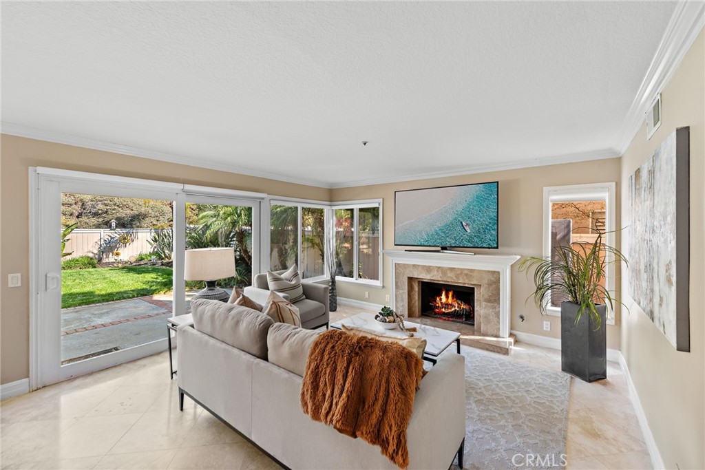 2170 Via Teca San Clemente, CA 92673 - Photo 5 of 20 a living room with furniture fireplace and flat screen tv