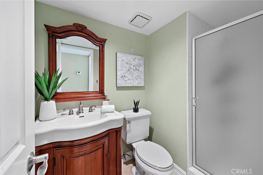 2170 Via Teca San Clemente, CA 92673 - Photo 10 of 20 a bathroom with a sink a toilet and mirror