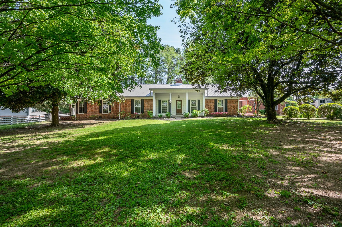 a house view with a garden space