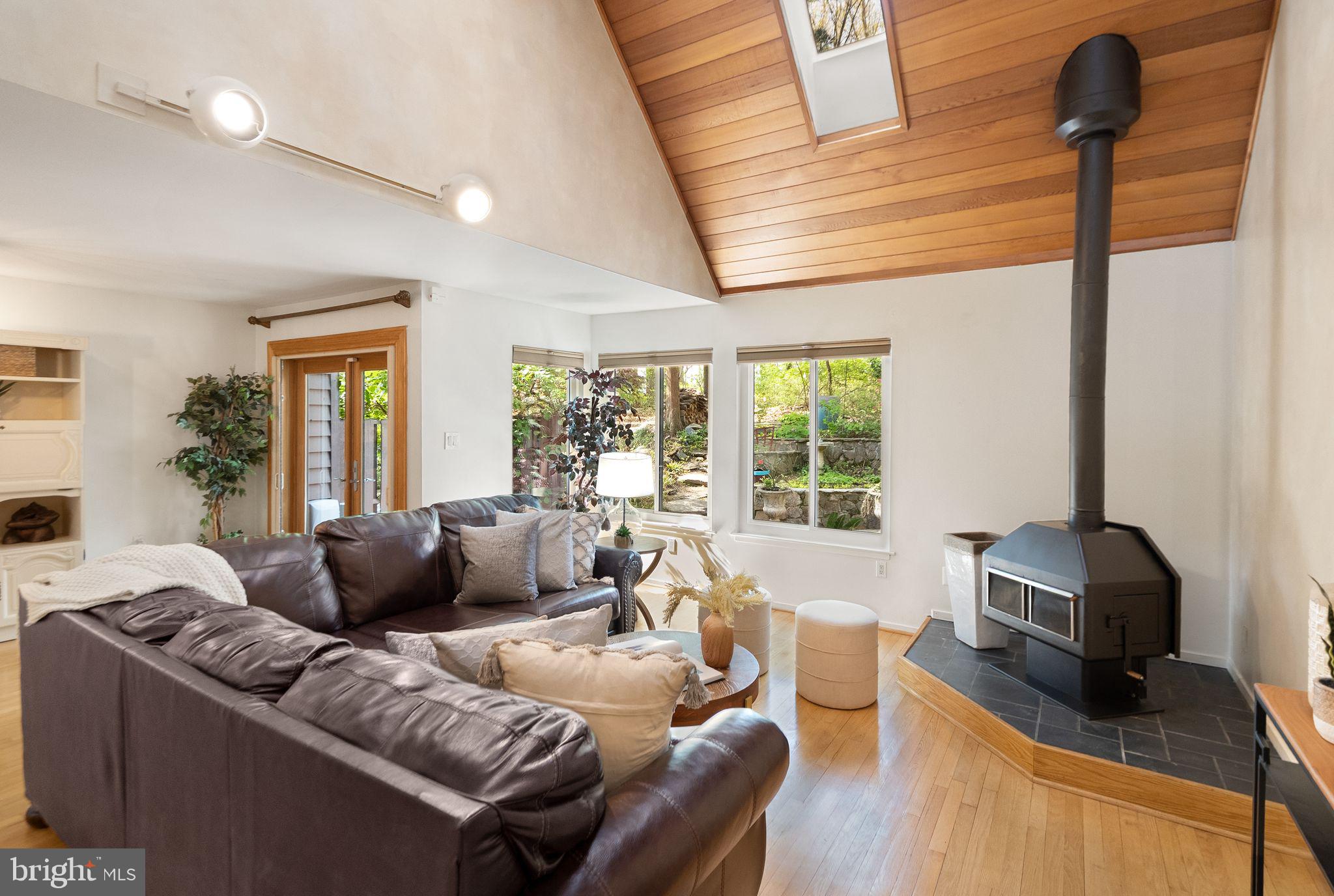 2013 Turtle Pond Drive Reston, VA 20191 - Photo 12 of 62 a living room with furniture and a flat screen tv