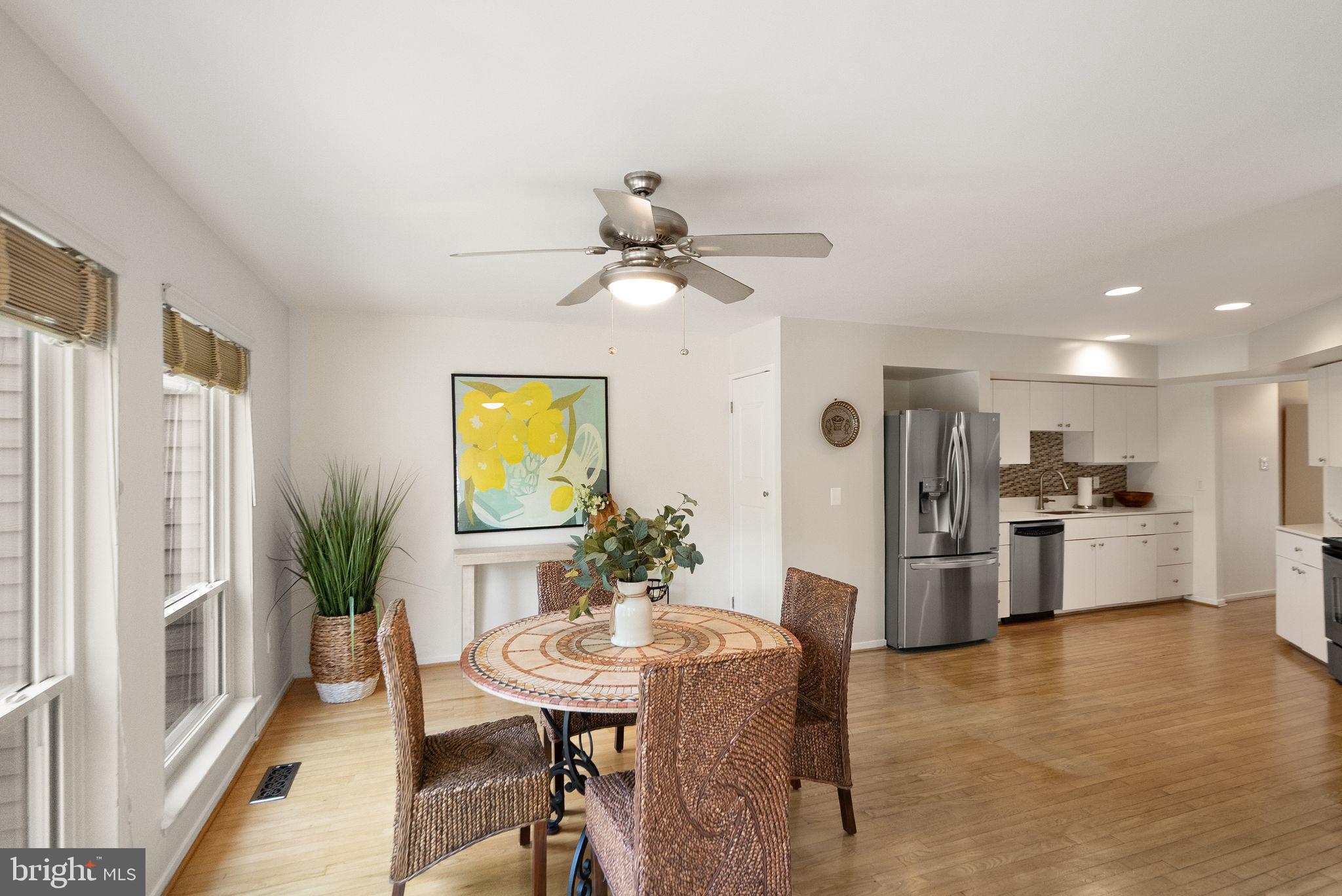2013 Turtle Pond Drive Reston, VA 20191 - Photo 19 of 62 a living room with stainless steel appliances furniture a chandelier and a view of kitchen