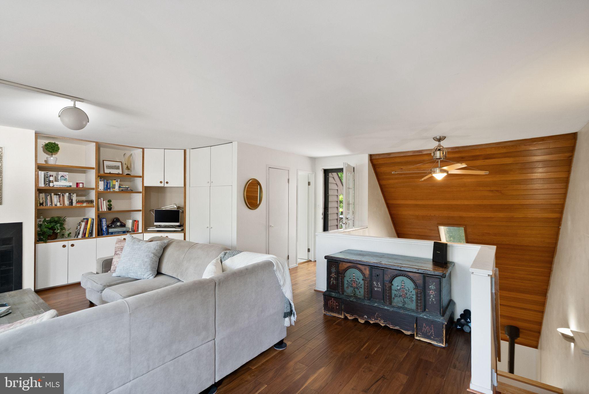 2013 Turtle Pond Drive Reston, VA 20191 - Photo 42 of 62 a living room with furniture and lamp