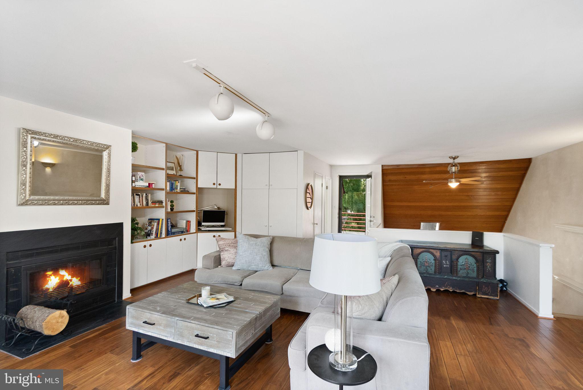 2013 Turtle Pond Drive Reston, VA 20191 - Photo 43 of 62 a living room with furniture and a fireplace