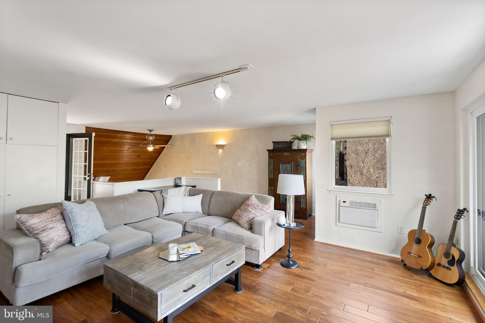 2013 Turtle Pond Drive Reston, VA 20191 - Photo 44 of 62 a living room with furniture and wooden floor