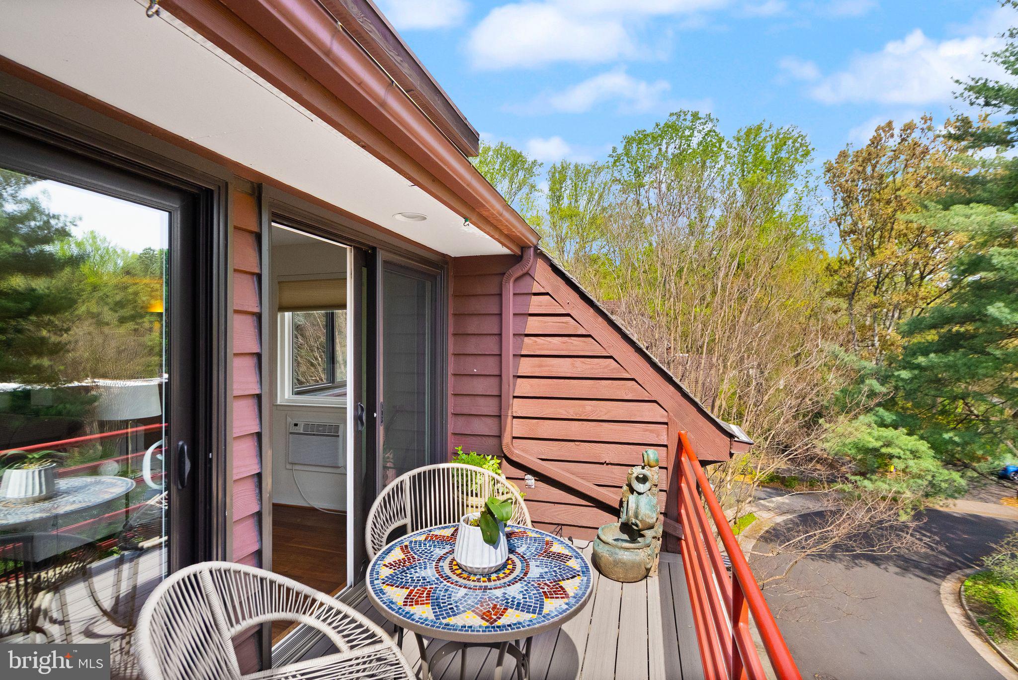 2013 Turtle Pond Drive Reston, VA 20191 - Photo 46 of 62 a balcony with table and chairs
