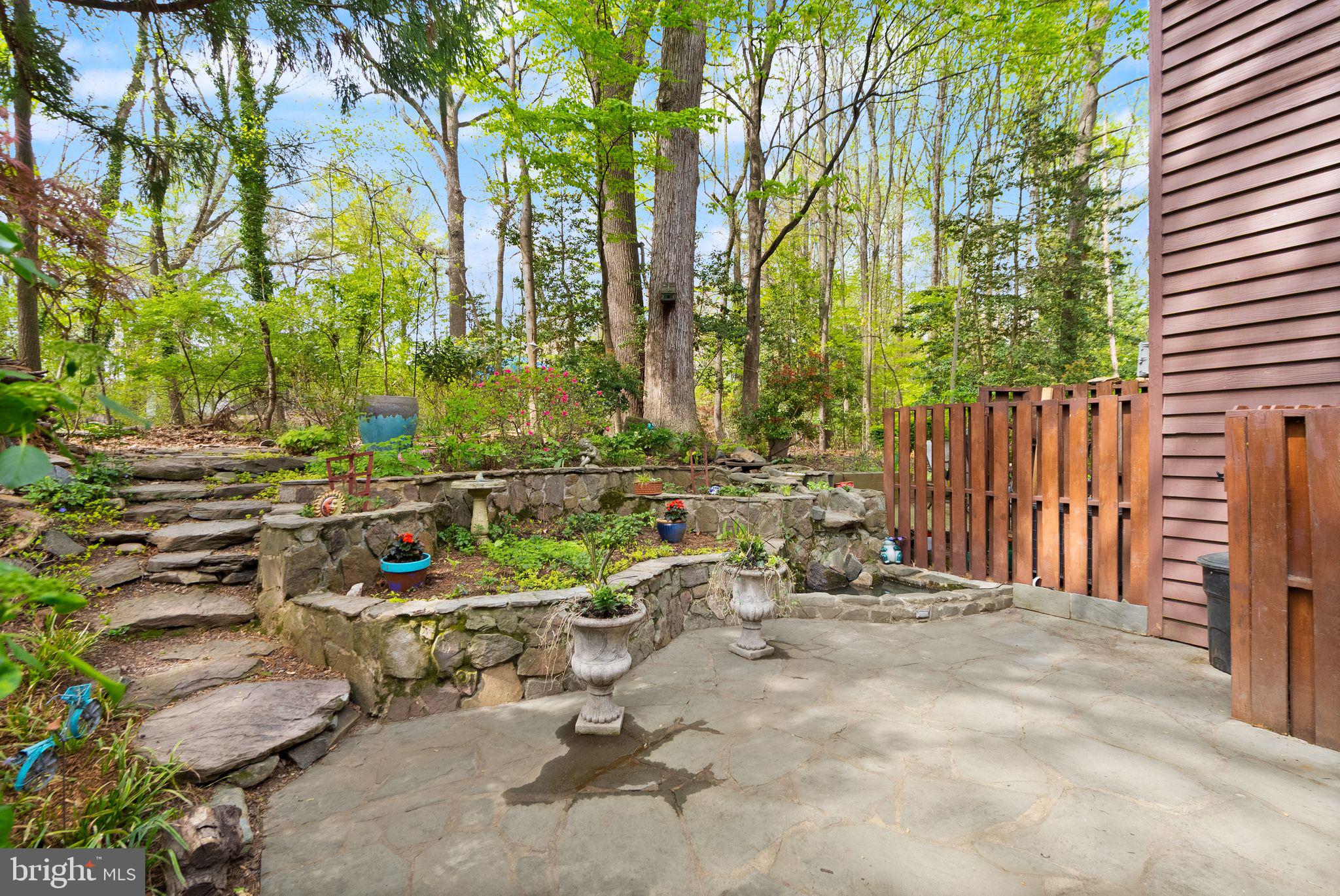 2013 Turtle Pond Drive Reston, VA 20191 - Photo 54 of 62 a view of backyard with swimming pool and sitting area