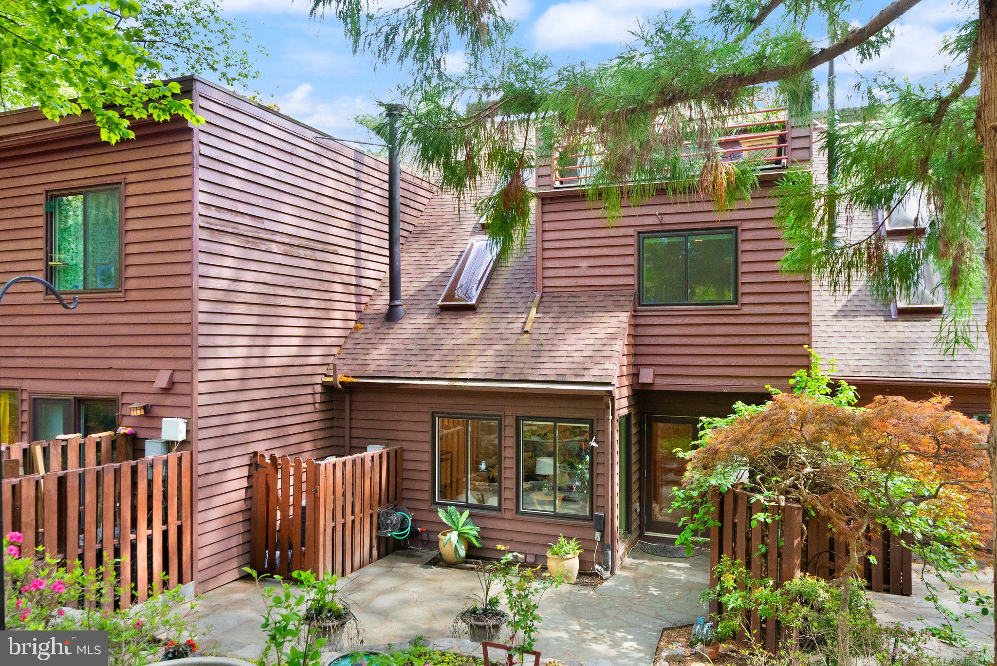 2013 Turtle Pond Drive Reston, VA 20191 - Photo 57 of 62 a front view of a house with garden