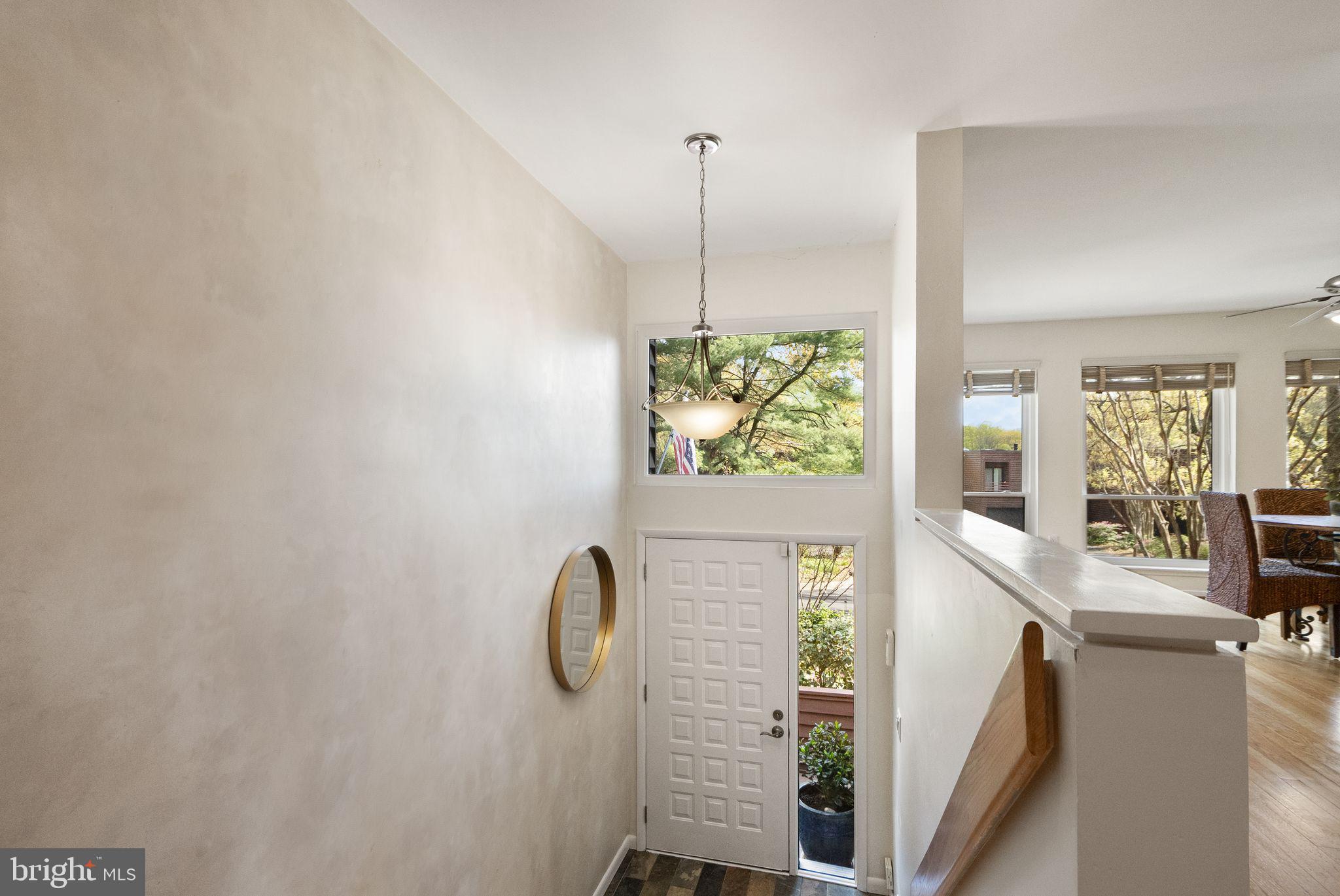 2013 Turtle Pond Drive Reston, VA 20191 - Photo 7 of 62 a view of a hallway with windows