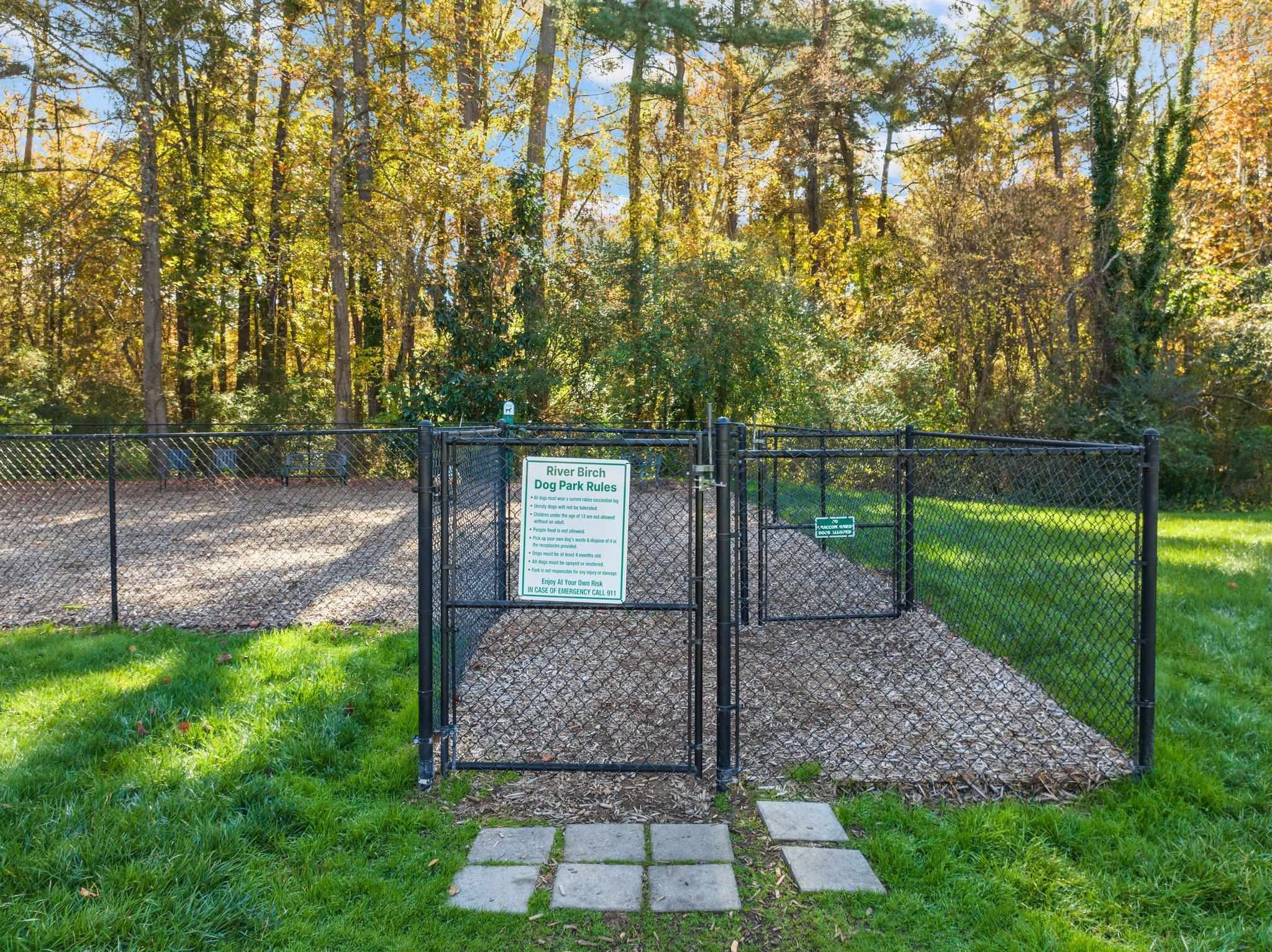1508 Township Circle Raleigh, NC 27609 - Photo 54 of 61 a backyard of a house with lots of green space