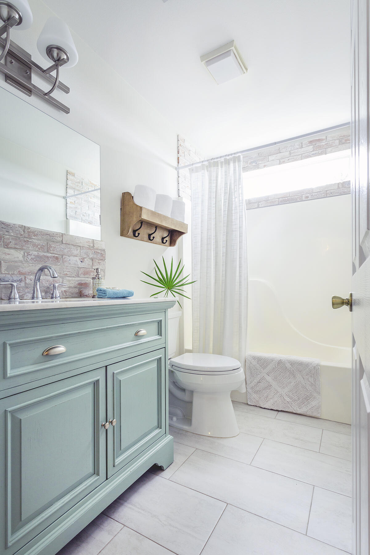 140 East Wild Blueberry Way Santa Rosa Beach, FL 32459 - Photo 38 of 48 a bathroom with a sink a toilet and shower