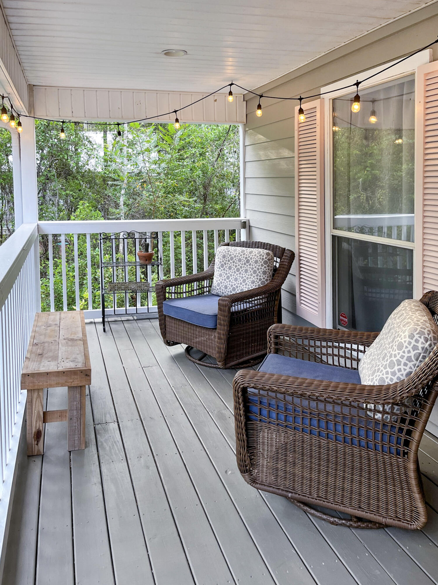 140 East Wild Blueberry Way Santa Rosa Beach, FL 32459 - Photo 4 of 48 a balcony with wooden floor table and chairs