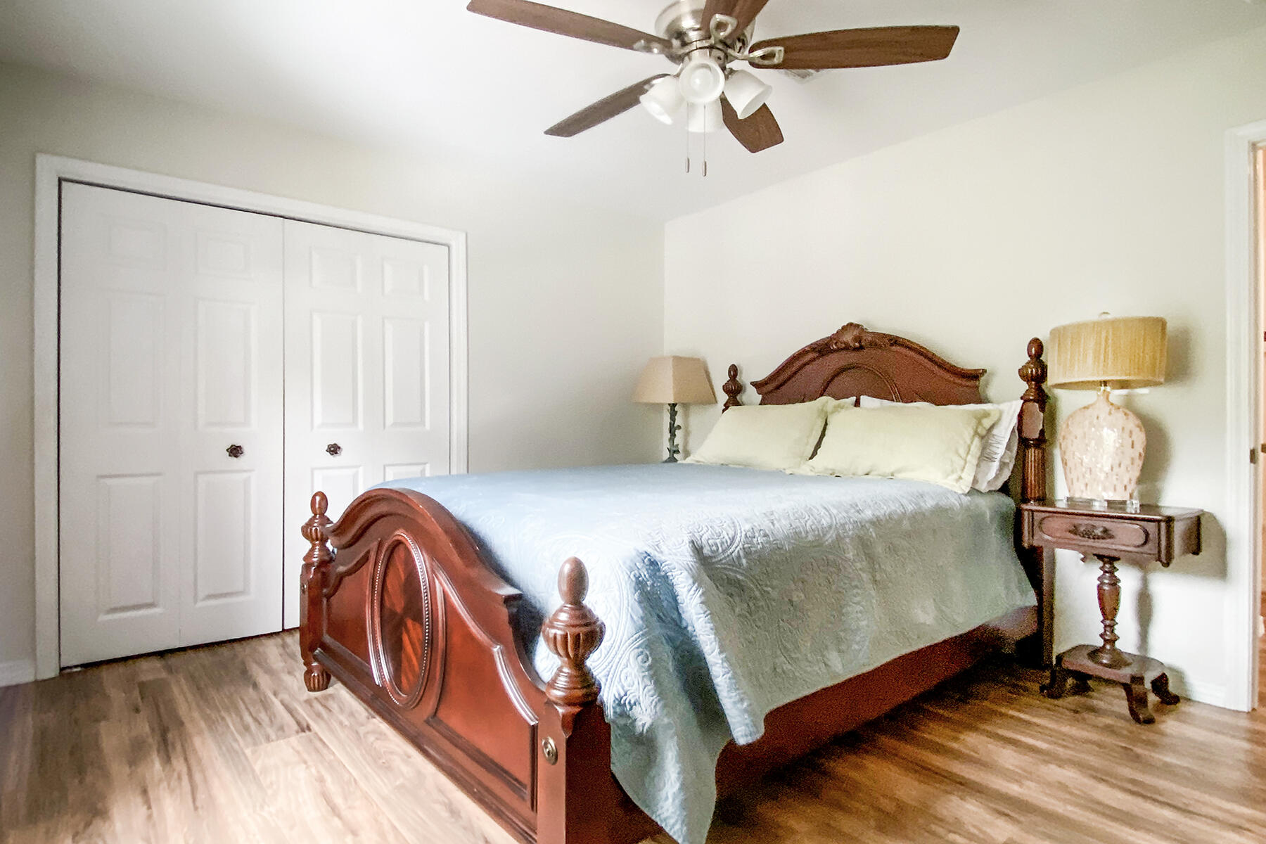 140 East Wild Blueberry Way Santa Rosa Beach, FL 32459 - Photo 42 of 48 a bedroom with a bed and wooden floor