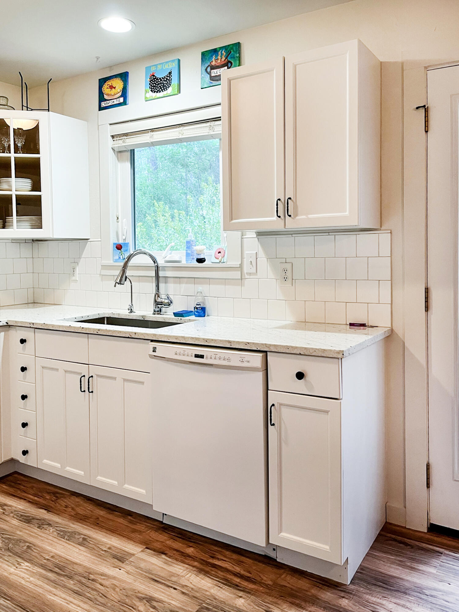 140 East Wild Blueberry Way Santa Rosa Beach, FL 32459 - Photo 6 of 48 a kitchen with appliances cabinets and a sink