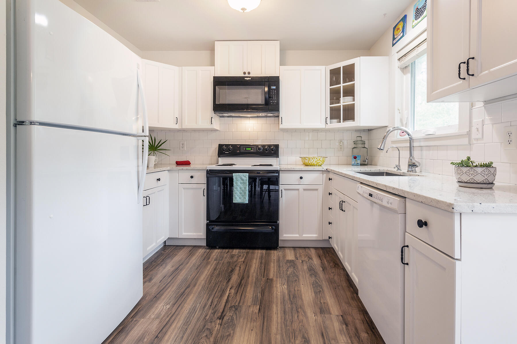 140 East Wild Blueberry Way Santa Rosa Beach, FL 32459 - Photo 10 of 48 a kitchen with a refrigerator stove and sink