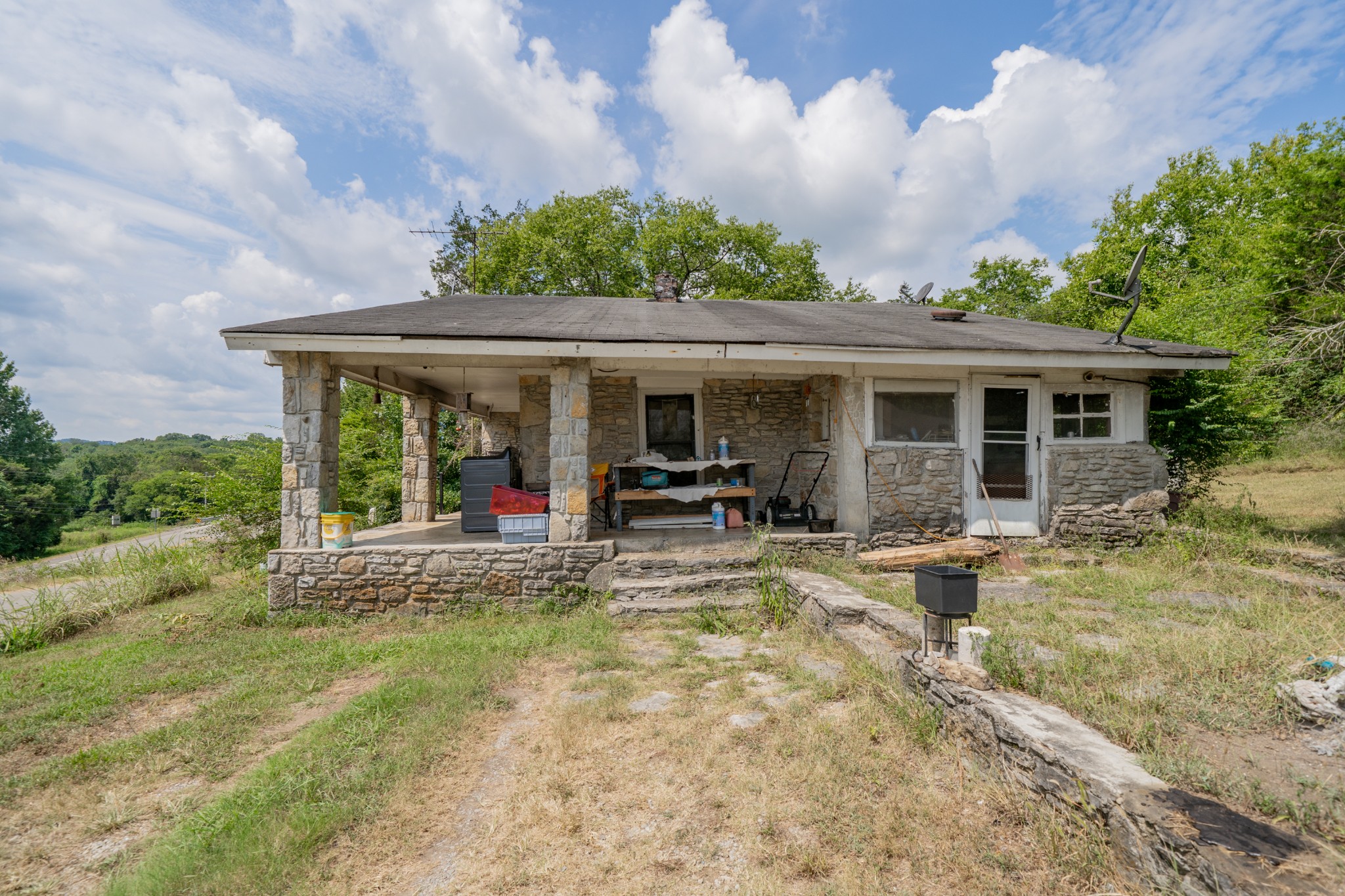 44 Cedar Circle Mulberry, TN 37359 - Photo 15 of 20 a view of a house with backyard porch and sitting area