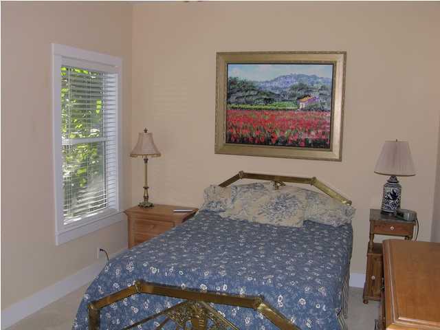 27 Hatchew Road Destin, FL 32550 - Photo 14 of 31 a bedroom with a bed and a window
