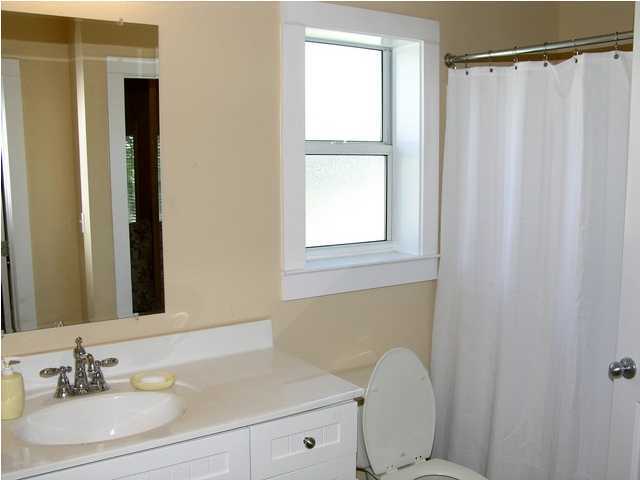 27 Hatchew Road Destin, FL 32550 - Photo 16 of 31 a bathroom with a sink toilet and shower