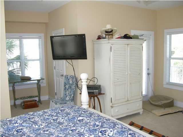 27 Hatchew Road Destin, FL 32550 - Photo 22 of 31 a living room with furniture and a flat screen tv