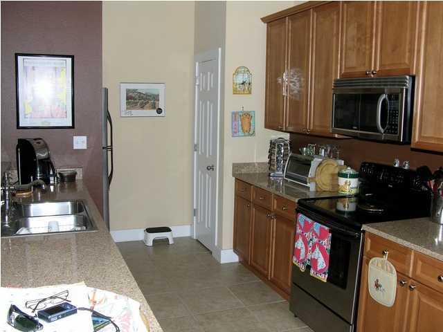 27 Hatchew Road Destin, FL 32550 - Photo 6 of 31 a bathroom with a sink and a mirror