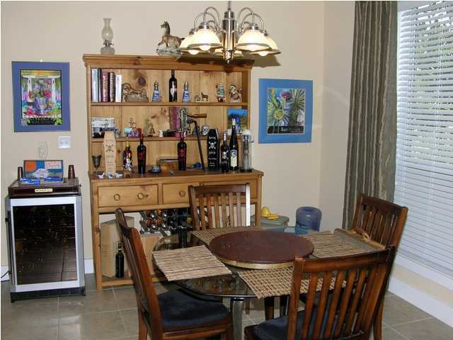 27 Hatchew Road Destin, FL 32550 - Photo 8 of 31 a view of a dining room with furniture and chandelier