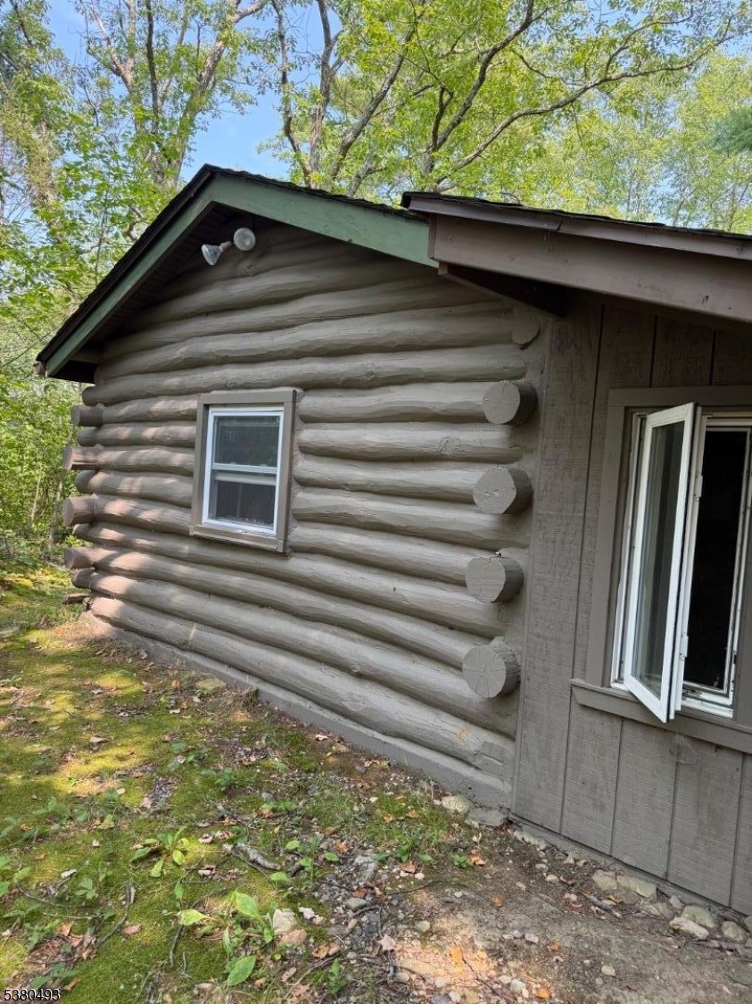 0 Rock Ledge Road West Milford, NJ 07480 - Photo 3 of 17 a front view of a house with a yard