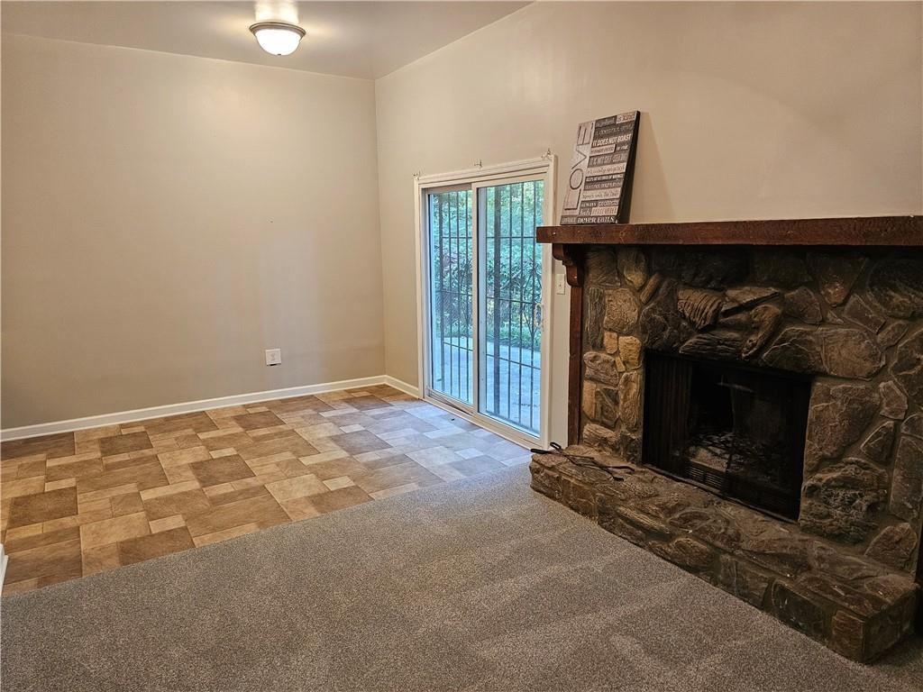 a room with fireplace and a fireplace