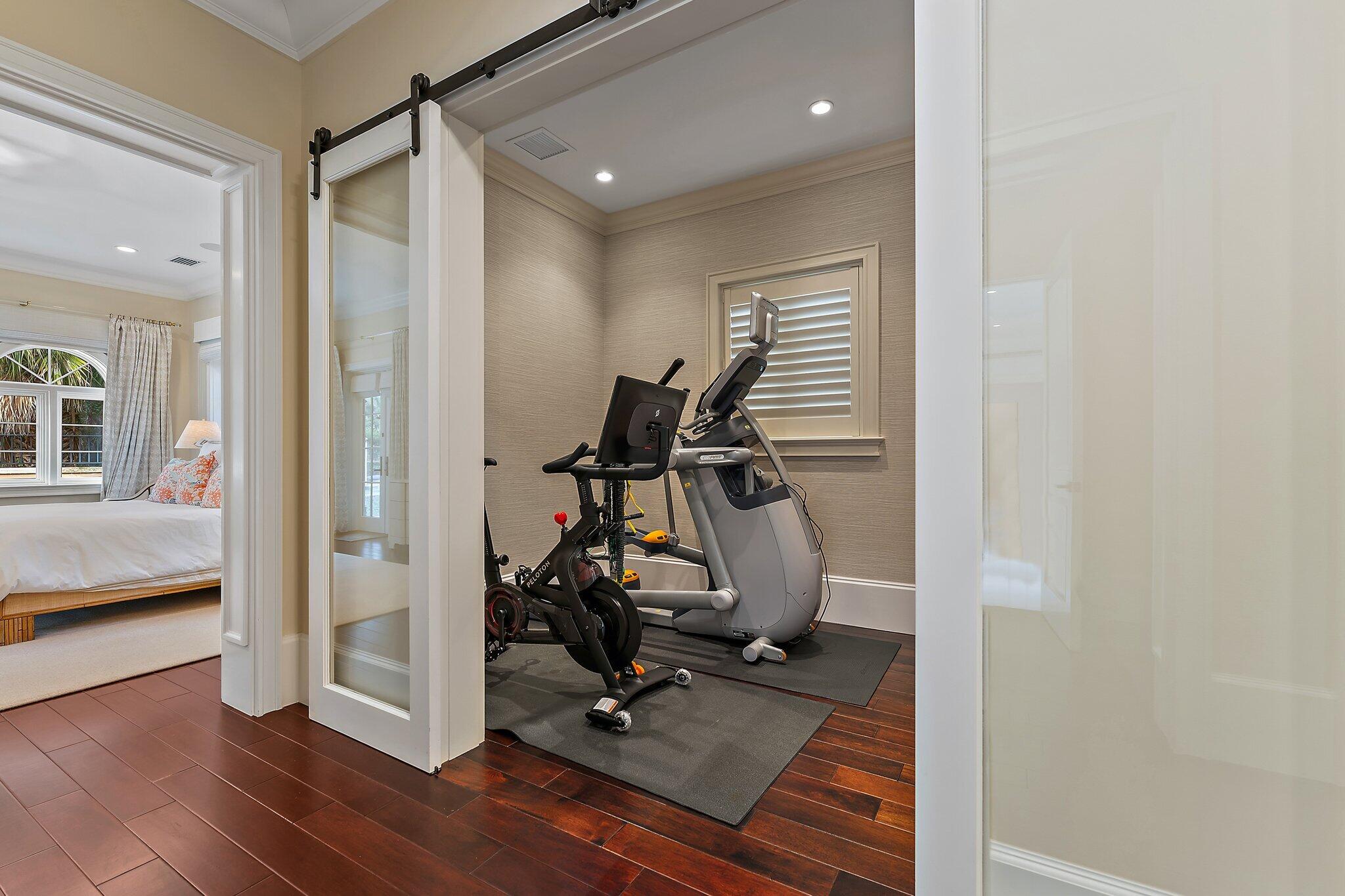 426 Via Del Orso Drive Jupiter, FL 33477 - Photo 35 of 54 a view of a room with gym equipment