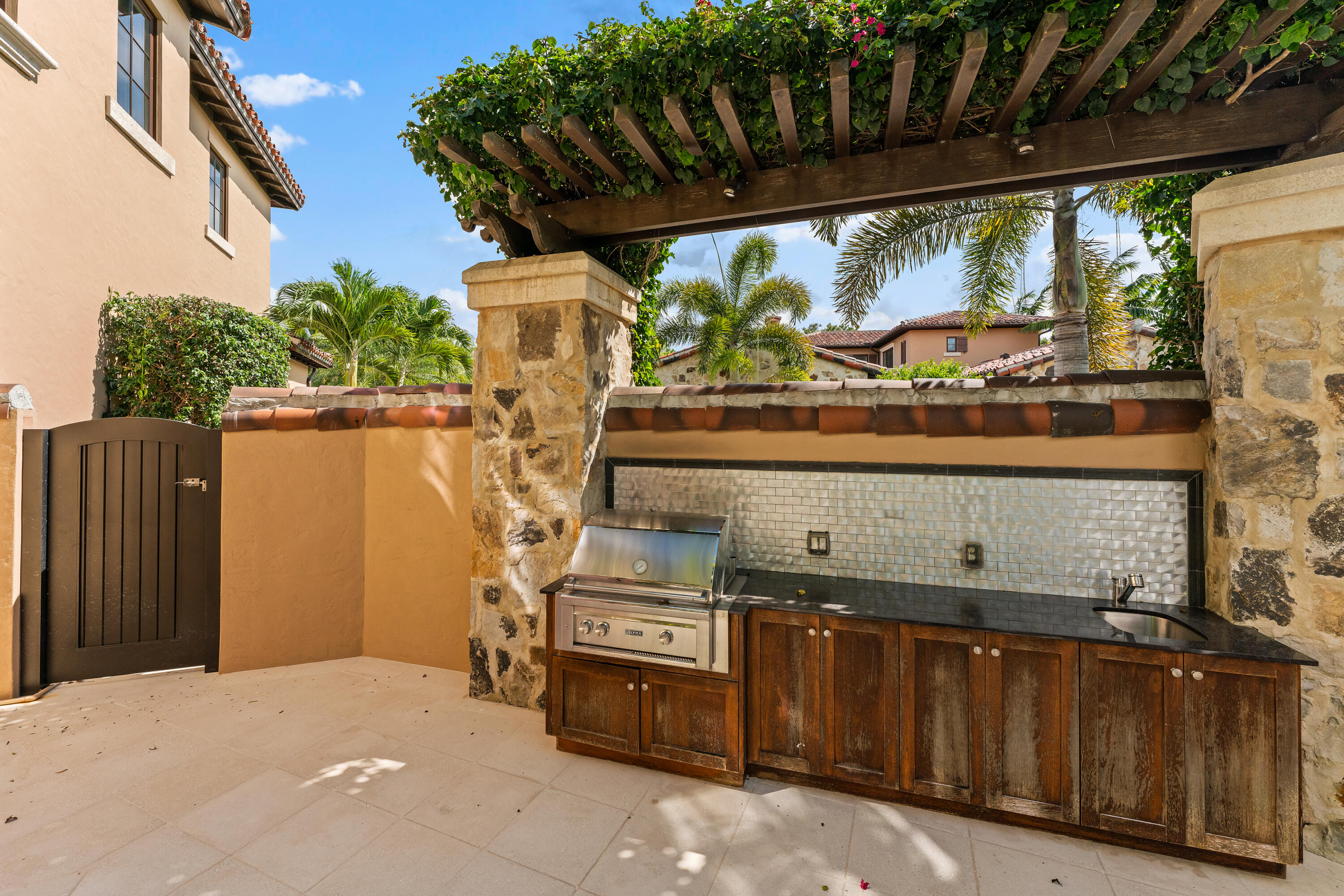 426 Via Del Orso Drive Jupiter, FL 33477 - Photo 50 of 54 a view of a backyard with a stove