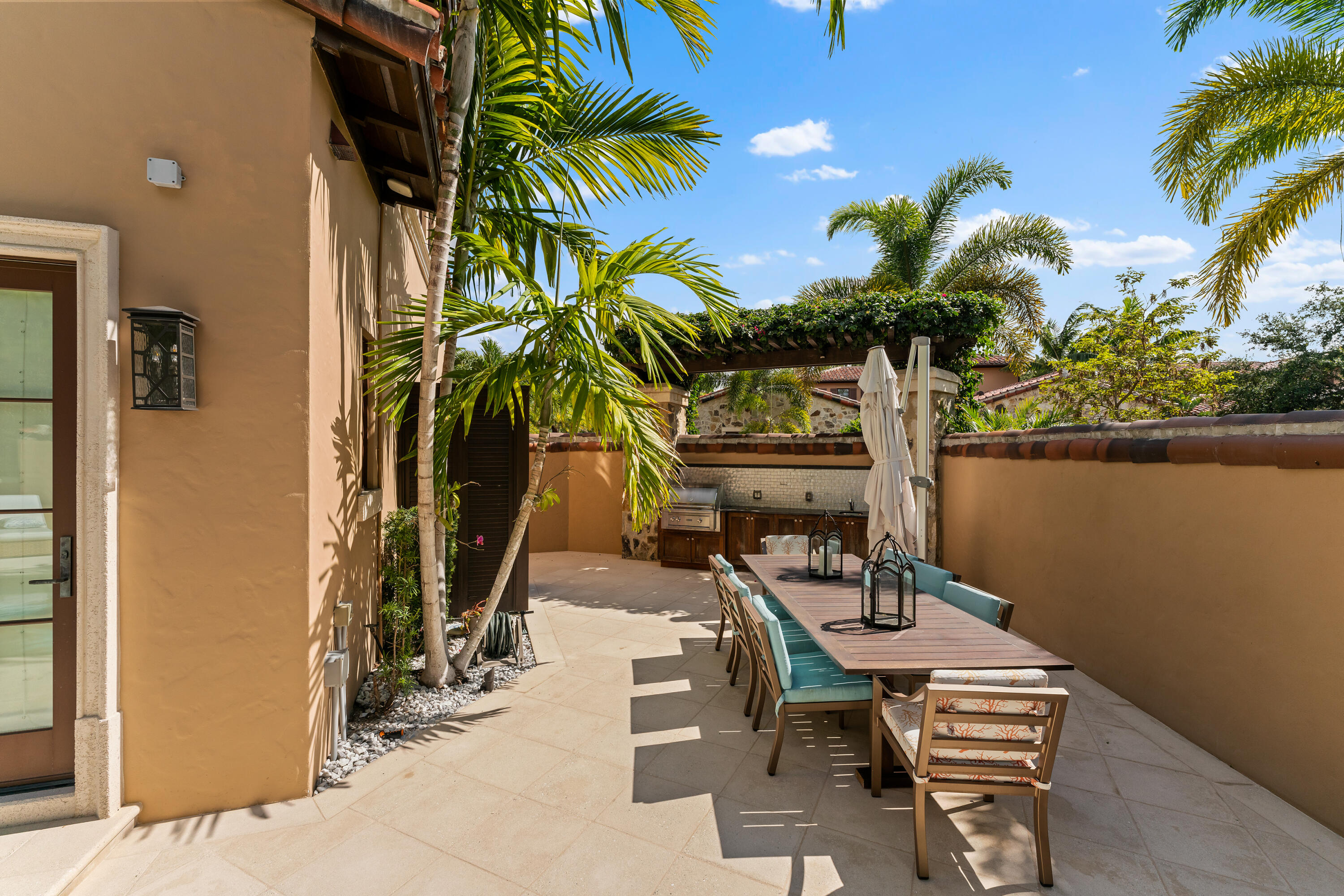 426 Via Del Orso Drive Jupiter, FL 33477 - Photo 51 of 54 a view of a backyard with a patio