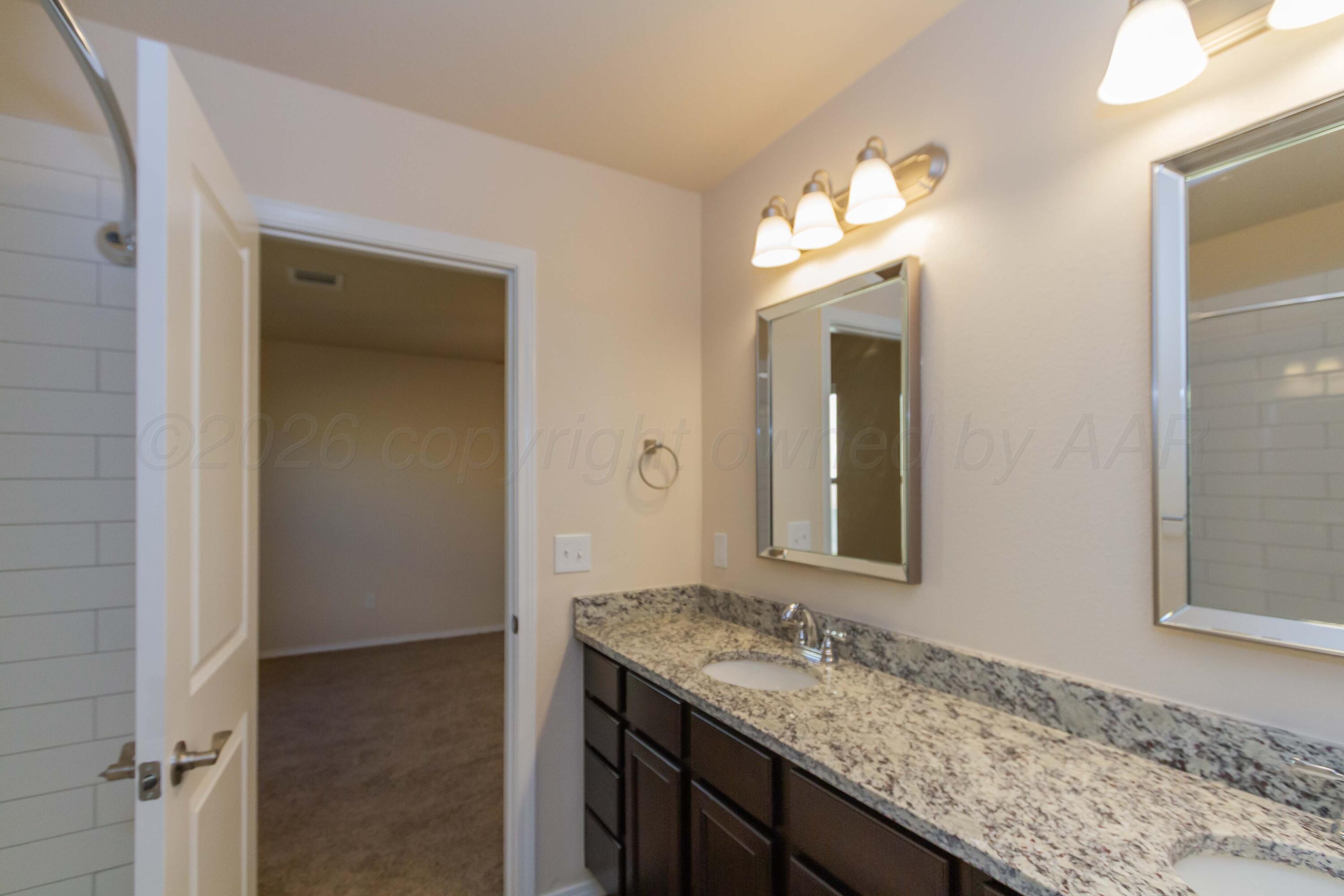 4303 Sunset Street Amarillo, TX 79118 - Photo 14 of 27 STOCK PHOPRIMARY BATH