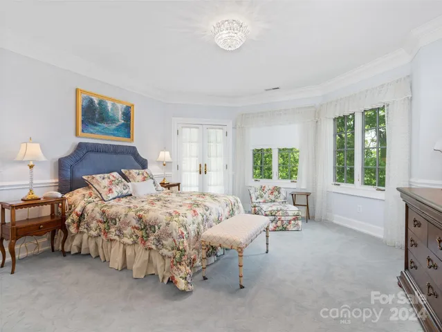 a bed room with a bed and a couch