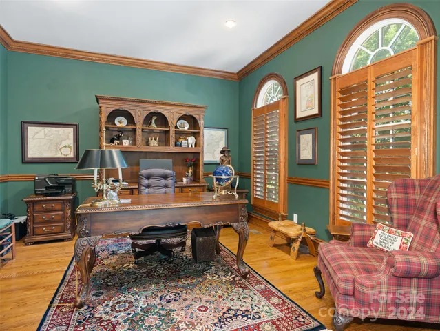 a view of a workspace with furniture