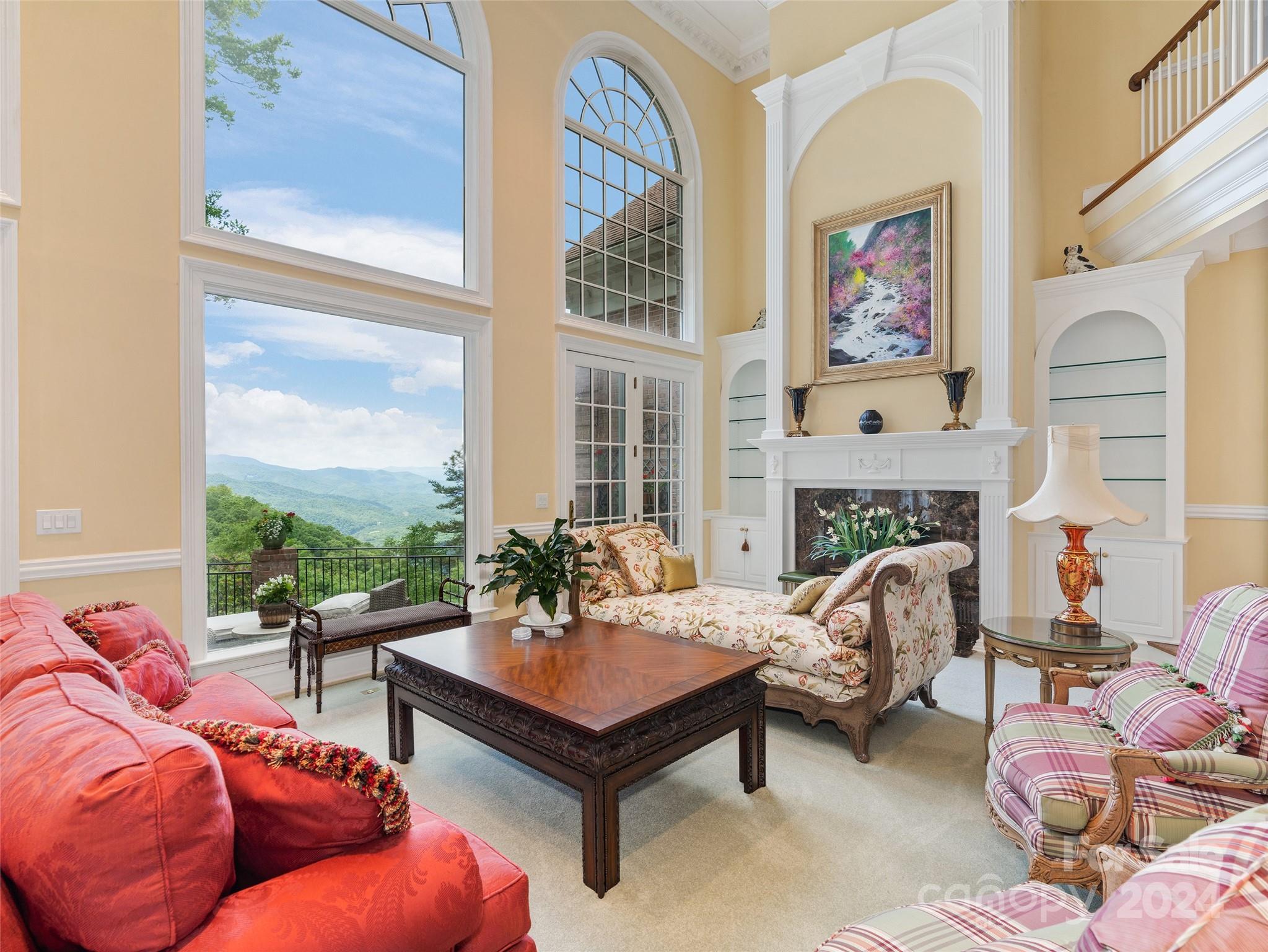 1767 Ridgeway Street Sylva, NC 28779 - Photo 7 of 46 a living room with furniture and a fireplace