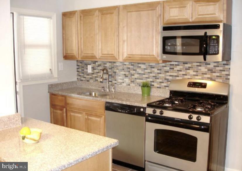 2114 Graythorn Road Baltimore, MD 21220 - Photo 8 of 17 Kitchen with Breakfast Bar