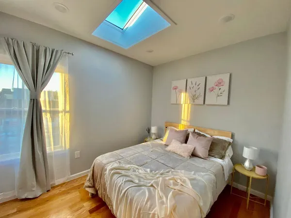 a bedroom with a bed and a walk in closet