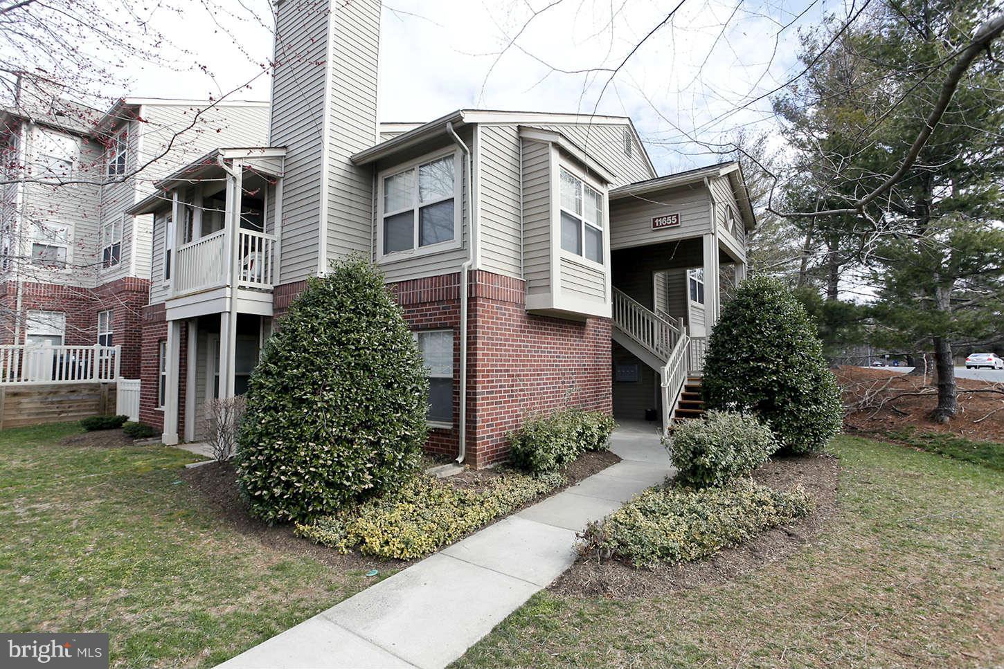 11655 Gas Light Court, Unit 11655D Reston, VA 20190 - Photo 2 of 30 Exterior (Front)