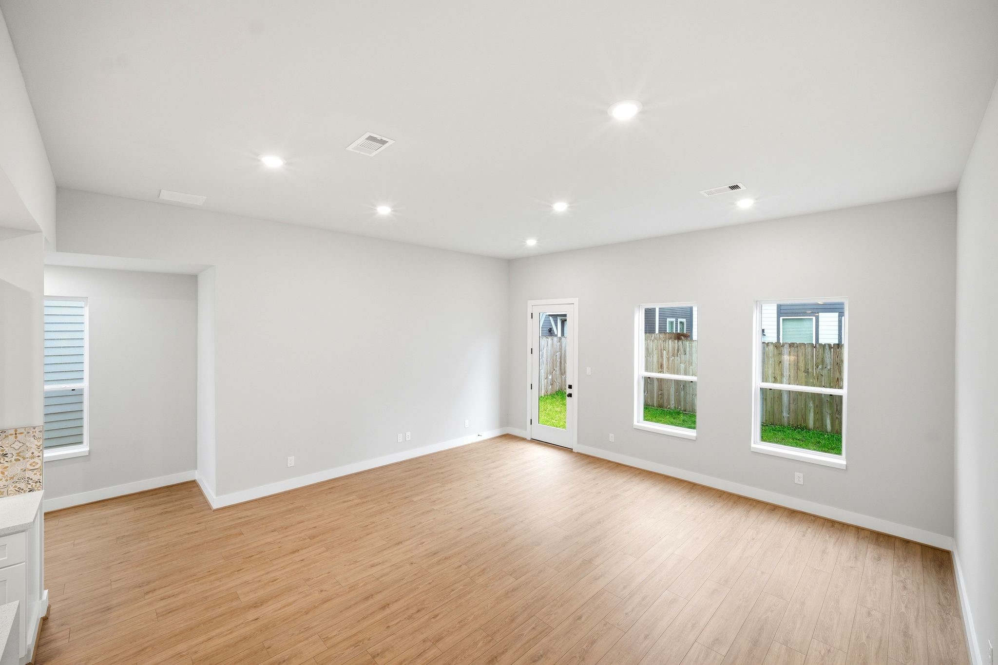 5814 Cebra Street Houston, TX 77091 - Photo 8 of 32 Abundant natural light fills the living space.