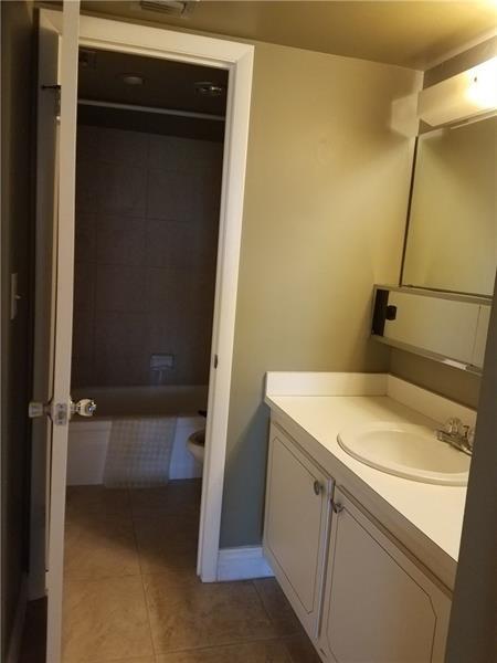 1400 St Charles Place, Unit 211 Pembroke Pines, FL 33026 - Photo 12 of 32 has private vanity area, large walk in closet, linen closet and another utility closet with separate entrance to