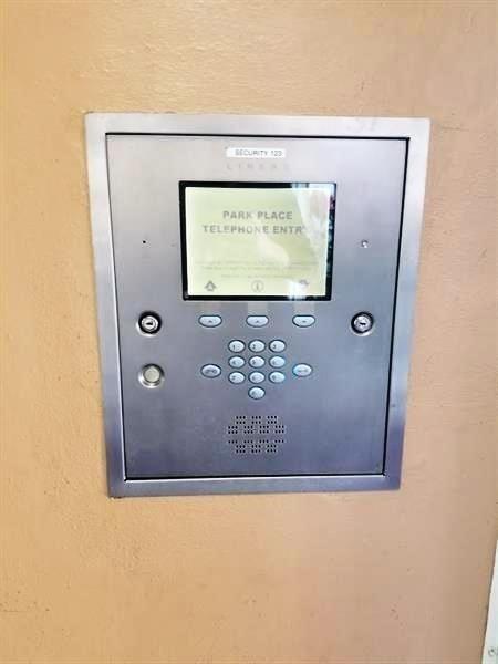1400 St Charles Place, Unit 211 Pembroke Pines, FL 33026 - Photo 21 of 32 Key pad for entry into Arbor Bldg