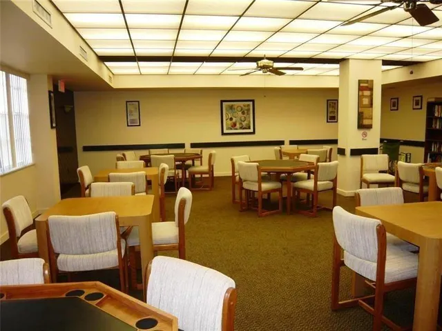 a outdoor living space with furniture and a fireplace