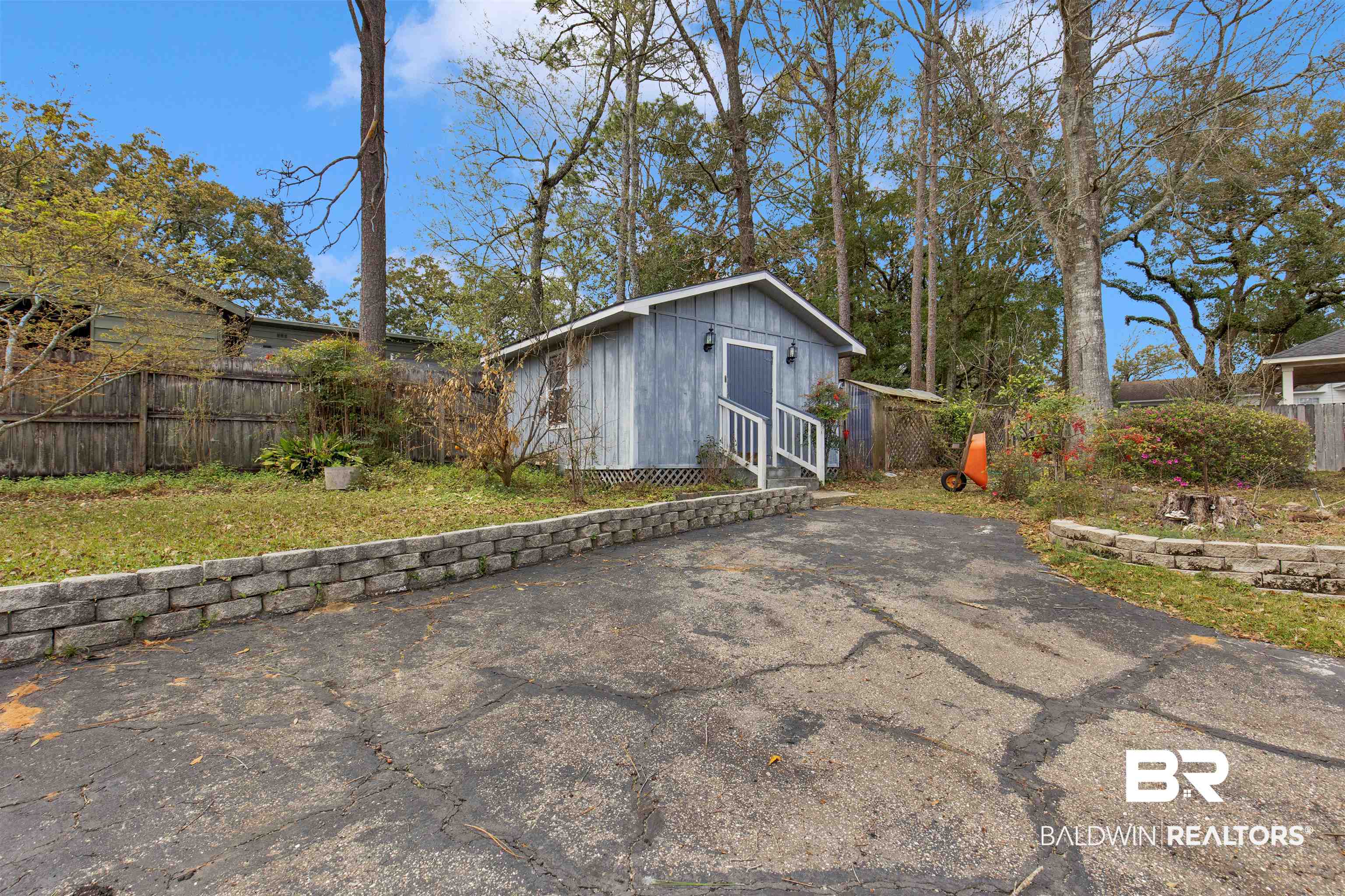 7225 Smithfield Road East Mobile, AL 36695 - Photo 22 of 27 Exterior space with entry steps and fence