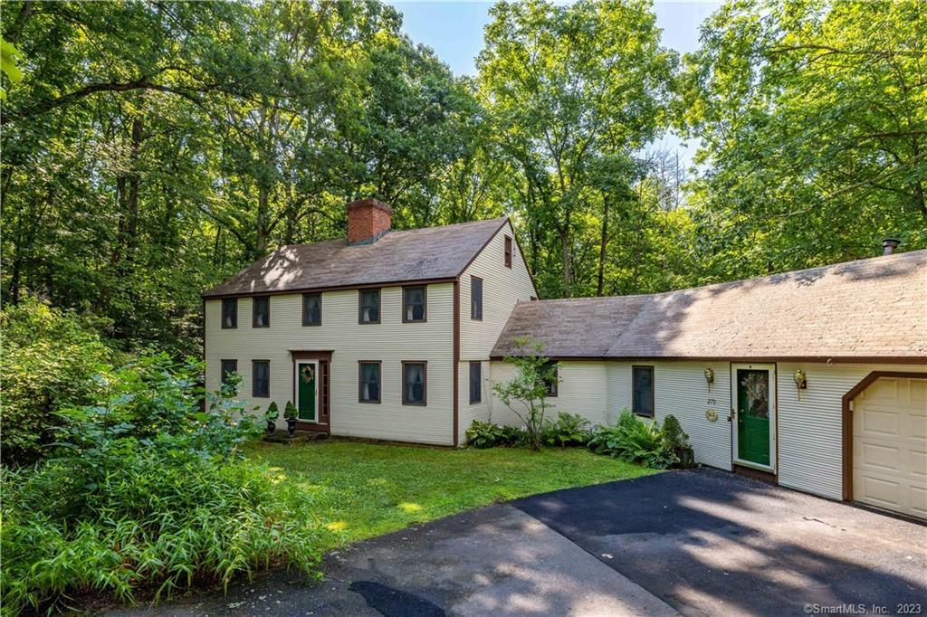 270 Mountain Spring Road Farmington, CT 06032 - Photo 1 of 1 a view of a yard in front of house