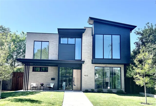 a view of house with yard and entertaining space